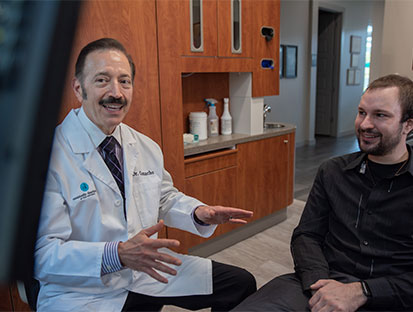 Dr. Camacho with one of his happy patient - image 2